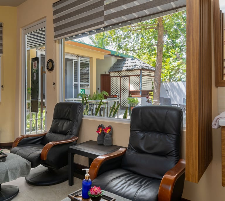 a living room with a view of a bathroom