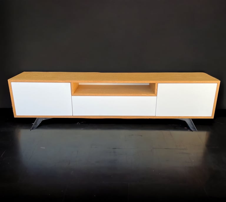 a tv unit with a white and yellow entertainment center