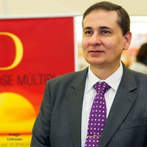 Photograph of Dr. Cícero Coimbra smiling, the great honoree of the night.