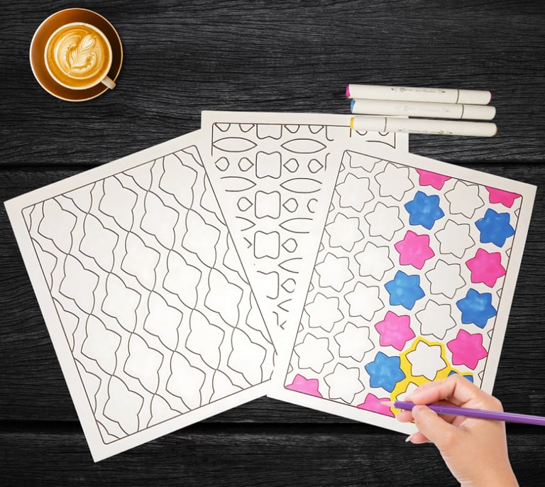 One of 3 coloring pages being colored on a wood table, surrounded by markers and a cup of cocoa.