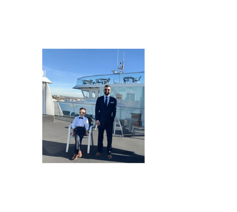 a man in a suit and tie standing next to a woman in a suit