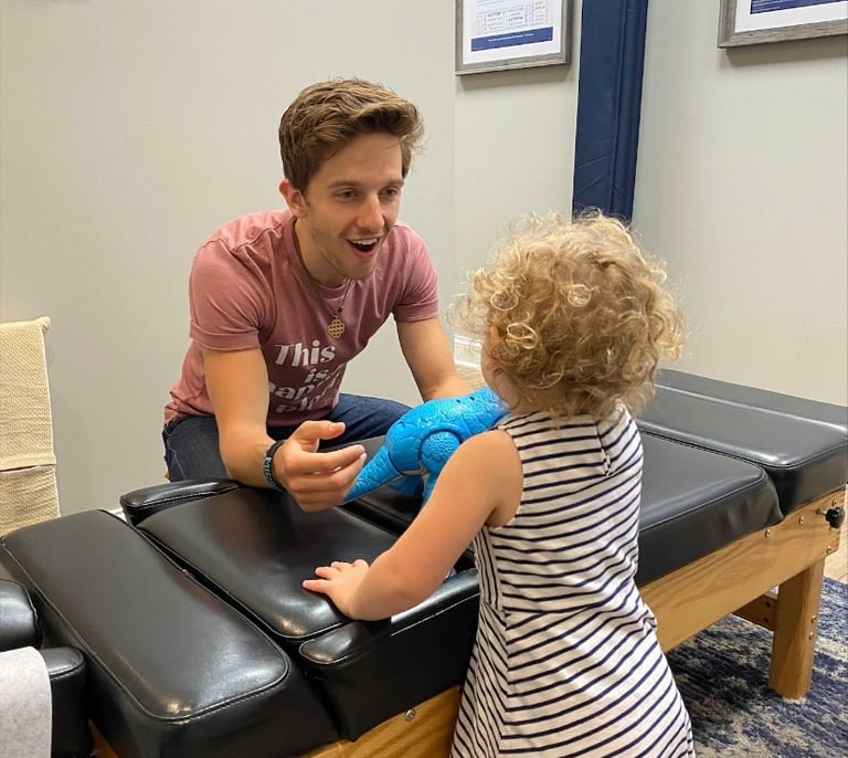 Child with sensory issues getting adjusted to calm her nervous system down. 