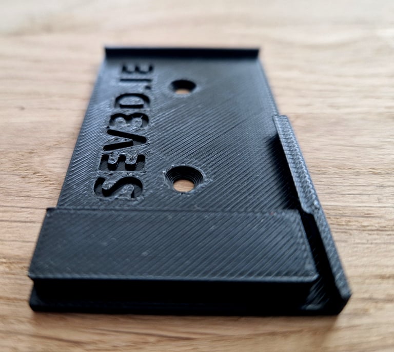 EZ Label Slide photo. Black plastic electronic label holder with SEV3D.IE description