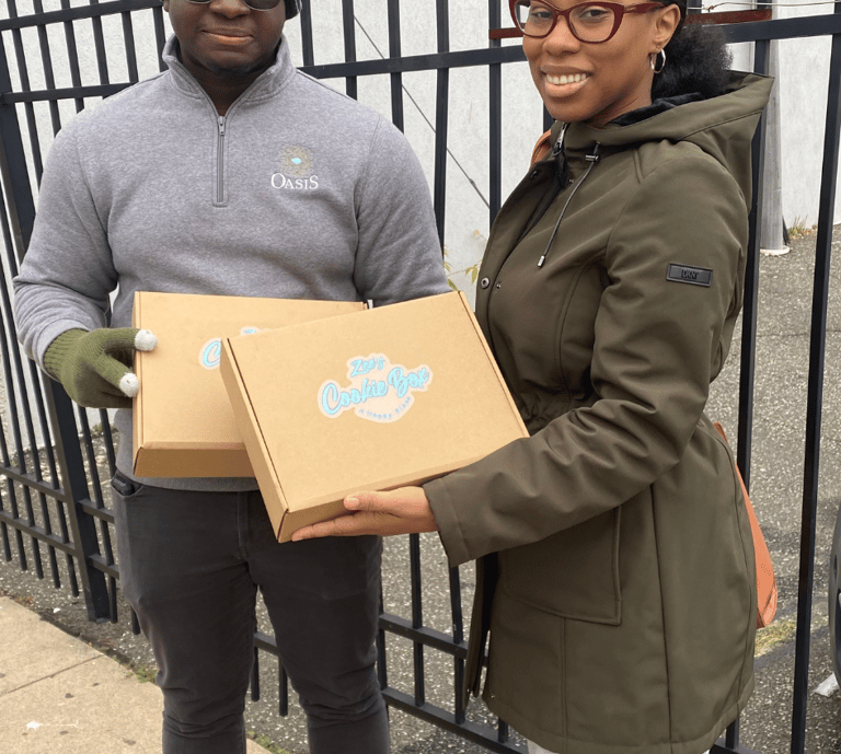 beautiful black woman smiling with homeless man