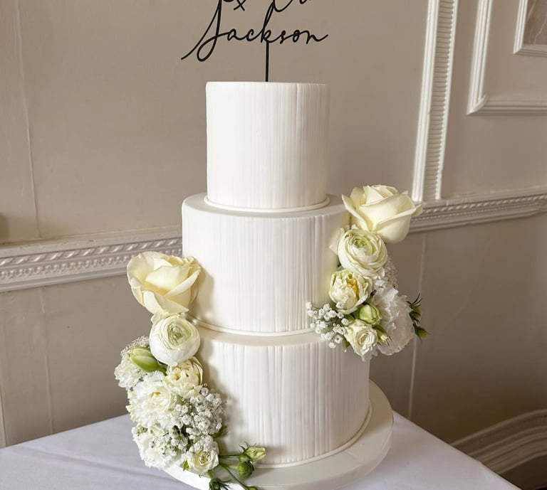 Iced 3 Tier Wedding Cake with Fresh Flowers By Sweetcupcakes Cakery