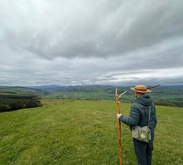 Rijusiddha looking out over the Welsh landscape