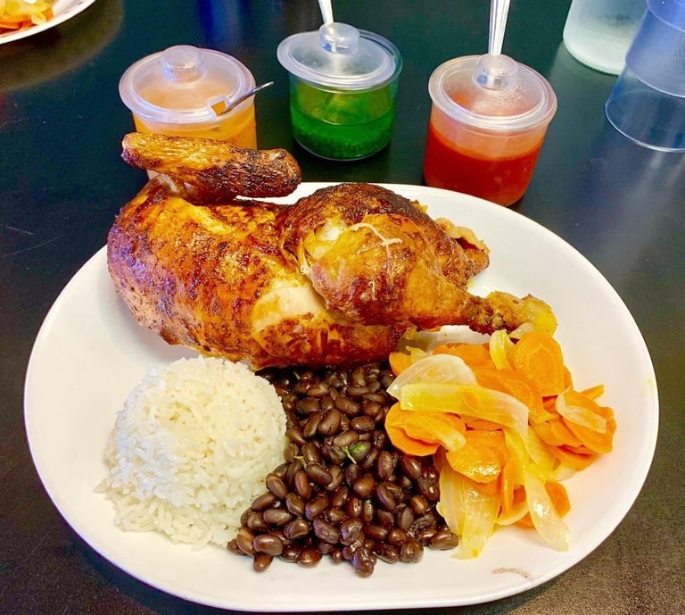 Las Brasas restaurant roast chicken dinner with flavorful sauces