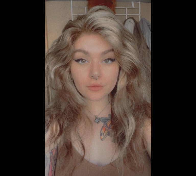 a woman with a tattoo on her chest