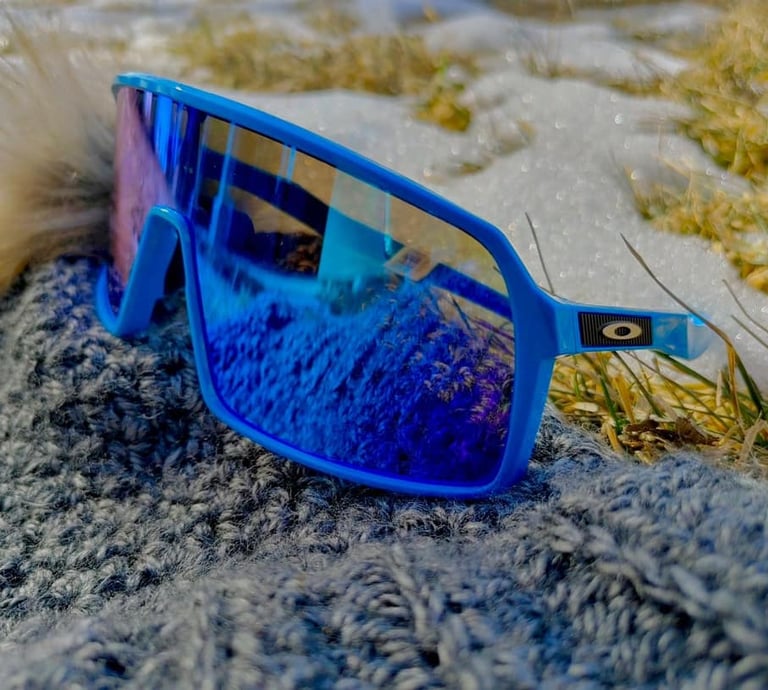 Oakley sports goggles sitting on a rock