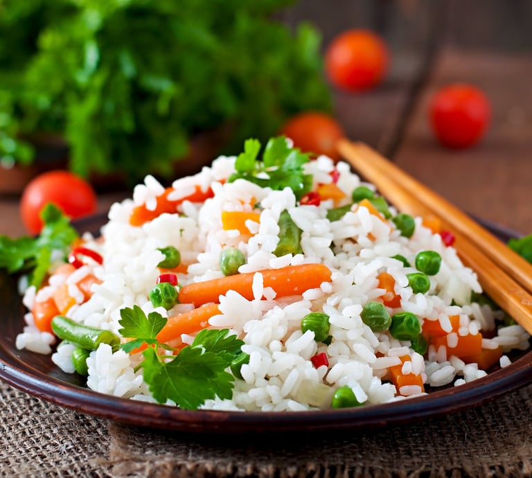 a plate of fried rice made with sona masoori rice at home.