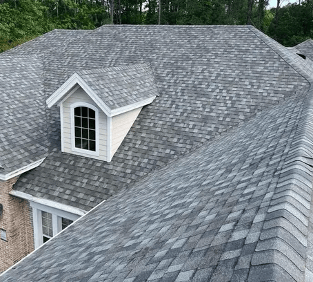 a man on a roof with a roof top