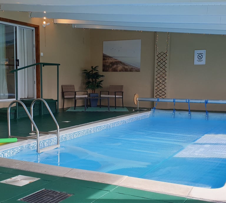 The heated indoor swimming pool at Redroofs