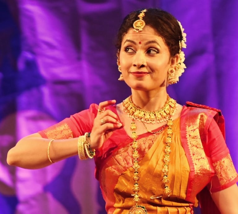 Indian classical dance performer honoring Lord Nataraja in a traditional pre-performance ritual.