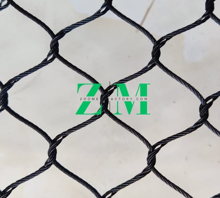 Durable black knotted nylon bird netting for garden and farm protection with a diamond mesh pattern.