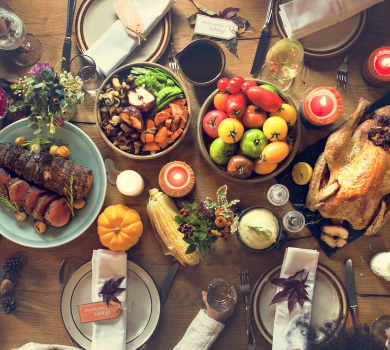 Order traditional Thanksgiving dinner featuring roasted turkey, beef, and autumn side dishes.