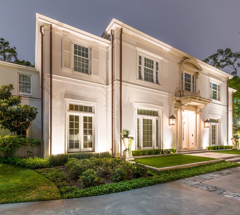 a large house with a driveway and a driveway