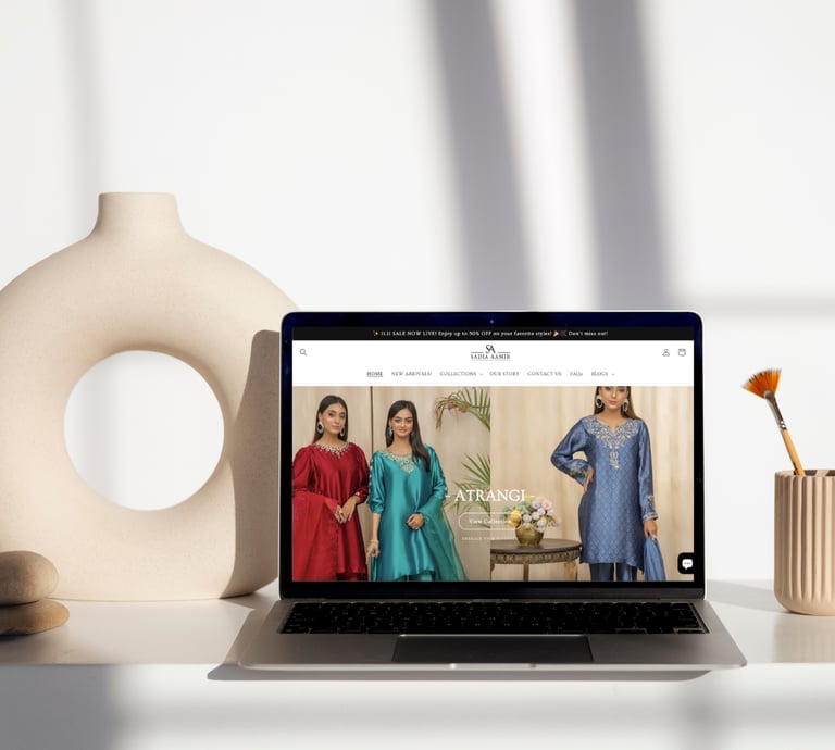 A picture on a laptop showing sadiaaamir.com website that was made by TDW