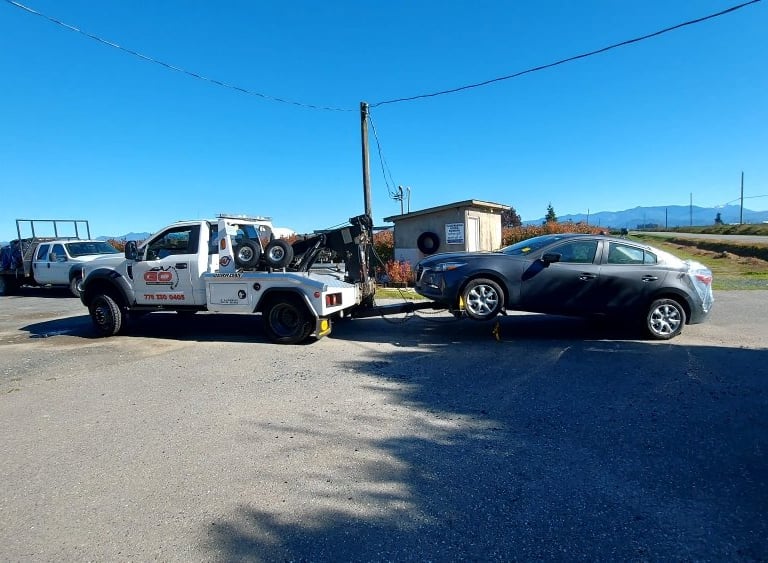 Car being towed in Langley BC roadside assistance