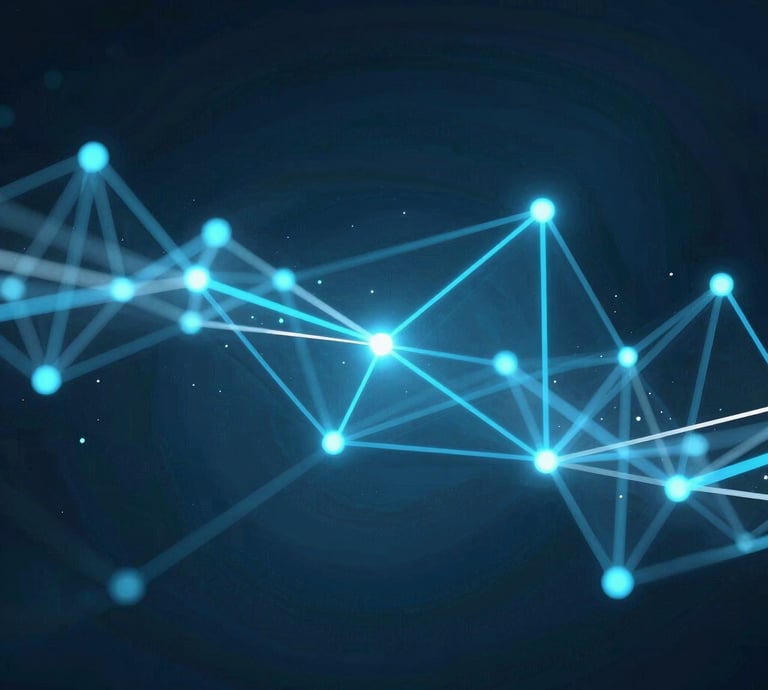 A friendly team collaborating over website designs in a bright, modern office space.