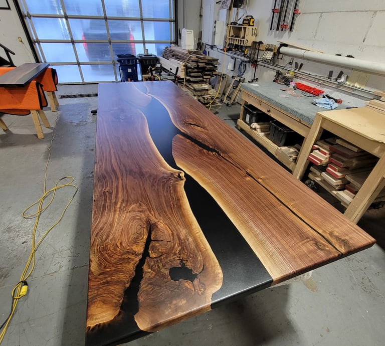 12ft x 4ft black walnut black epoxy river boardroom table — Polaris