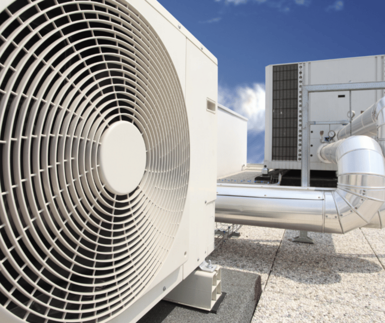 a couple of air conditioning units on a roof top