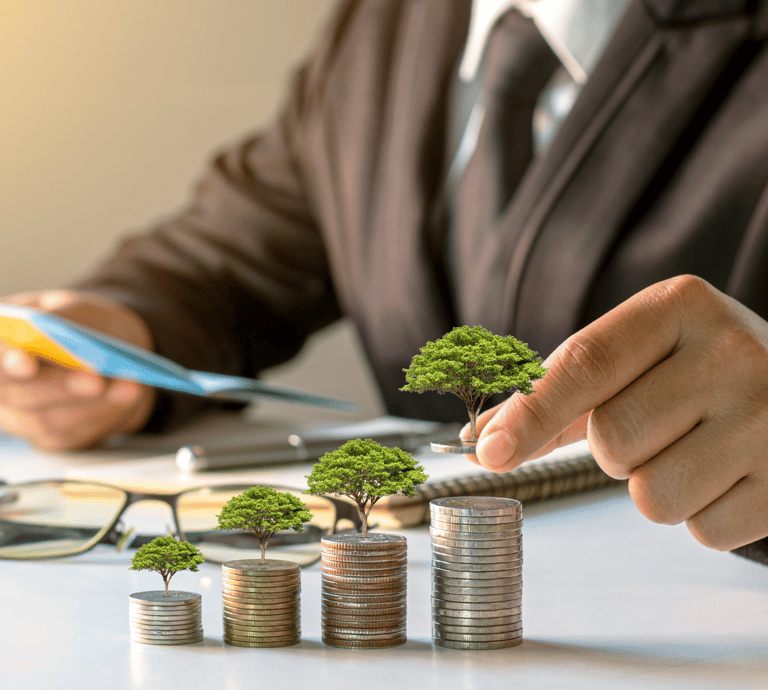 a man in a suit and tie is putting coins into a stack of coins