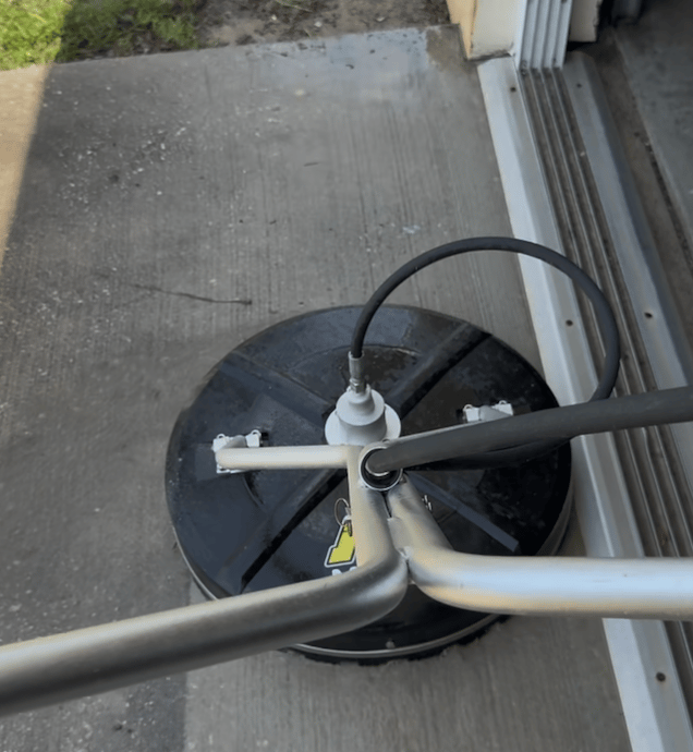 a pressure wash equipment with a handlebar and a handlebar
