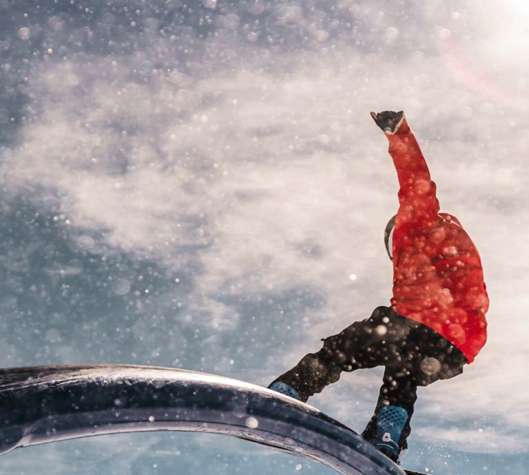 a man on a snowboard in the snow