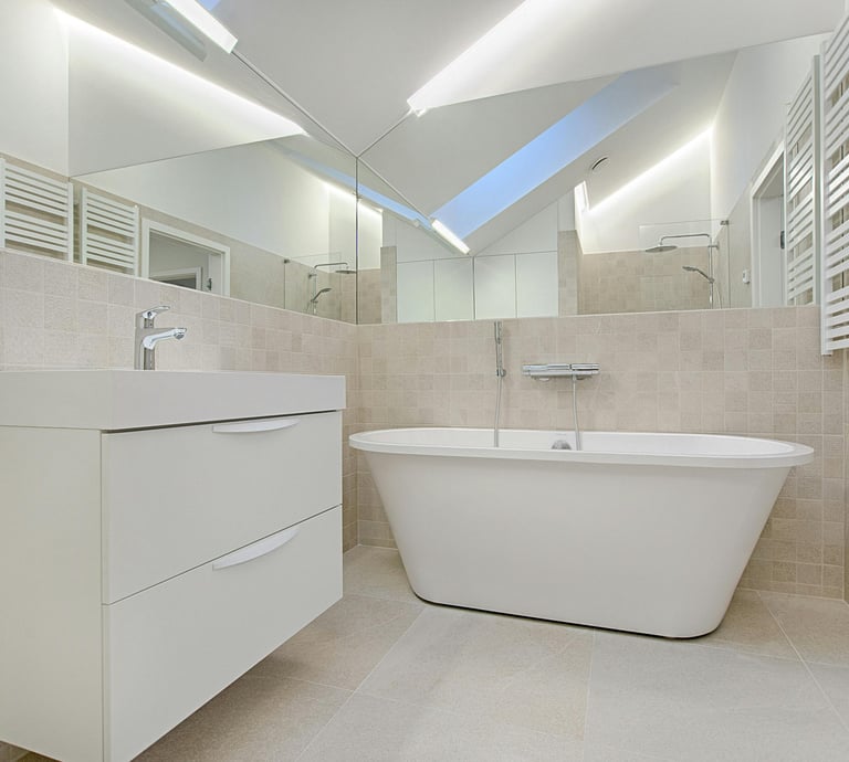 a bathroom with a bathtub and a skylight