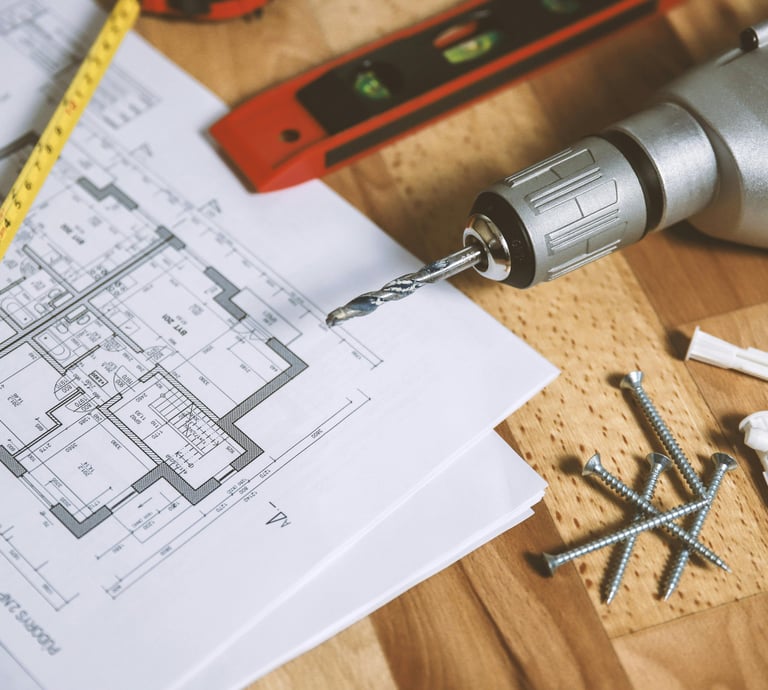 a drillet with screw screws and screws on a table