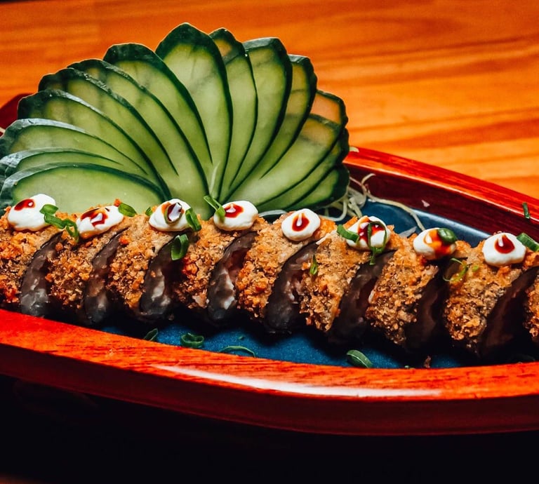 a plate of food that includes a large leafy plant