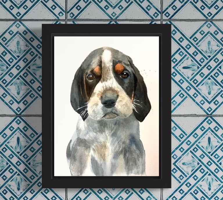 a custom watercolor portrait of a dog in a black frame