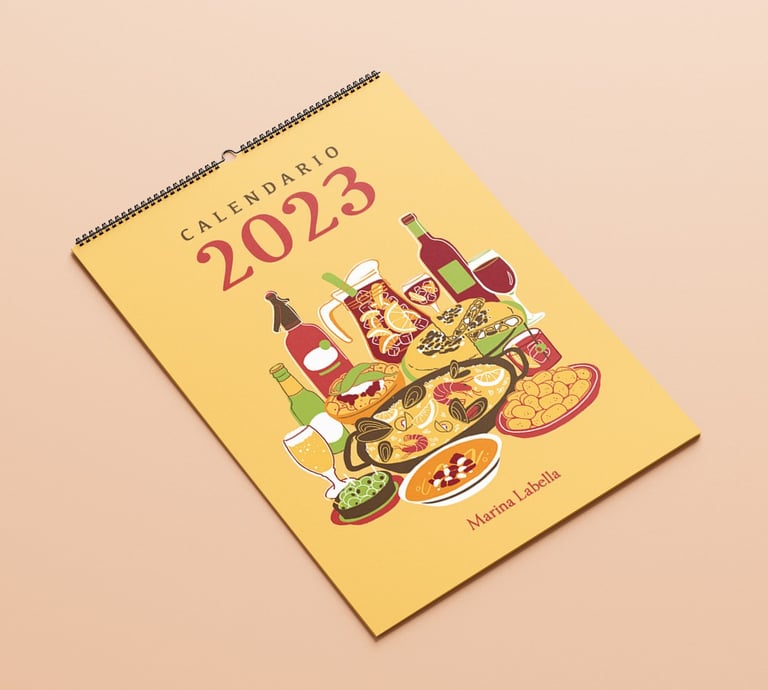 a 2023 calendar cover with food plates of Spanish gastronomy