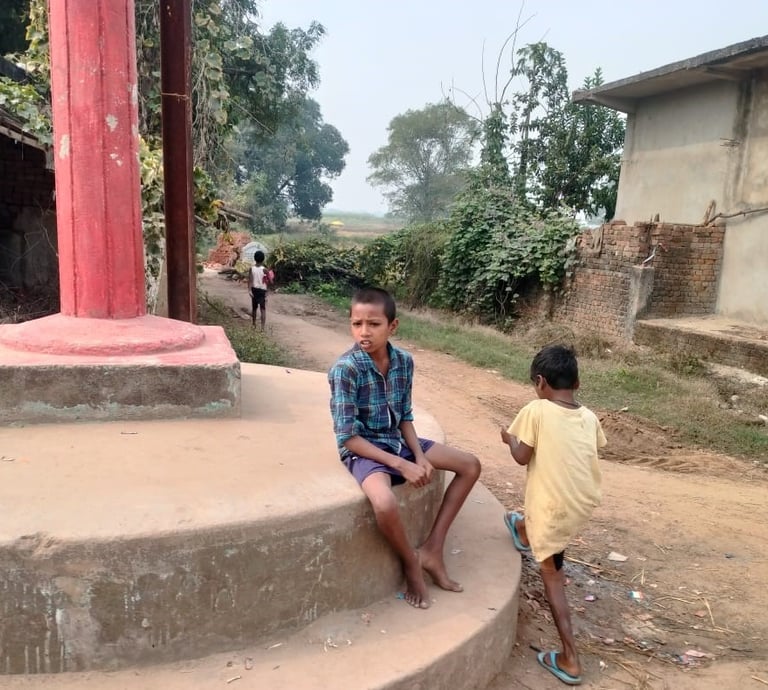 a boy sit on the atal chowk