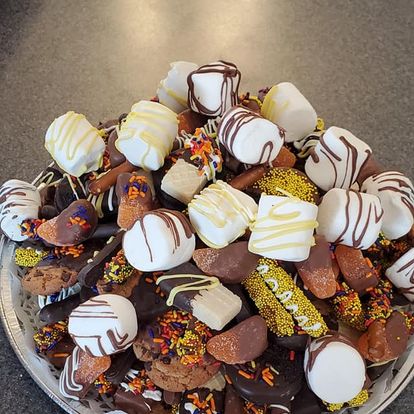a plate of chocolate covered chocolate covered cookies