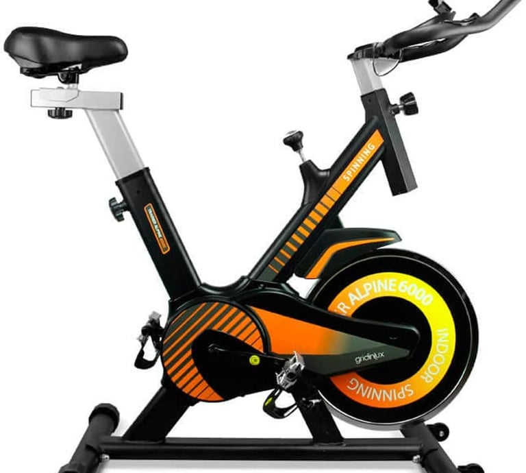a stationary bike with a black and orange bike