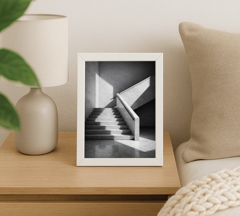 Framed black-and-white wall art print in a minimalist living room