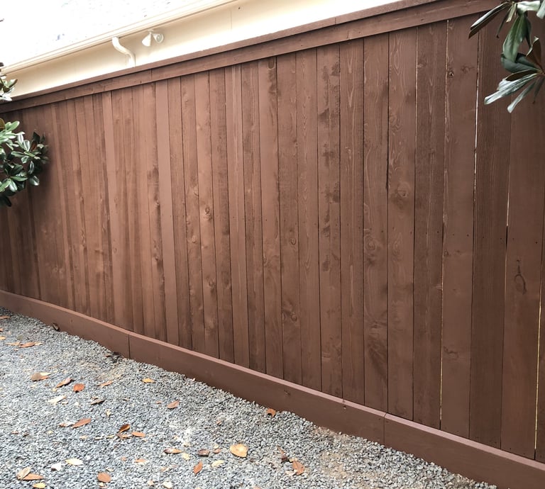 Russet brown sherwin williams superdeck stained wood fence