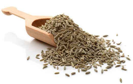 a scoop scooper full of  cumin seeds with transperent background 