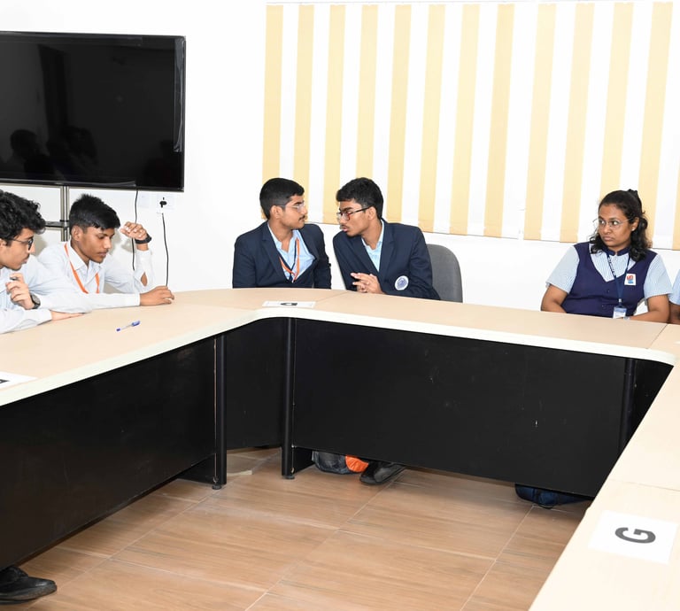 Student contestants engaged in the preliminary quiz round of BPMMQ!