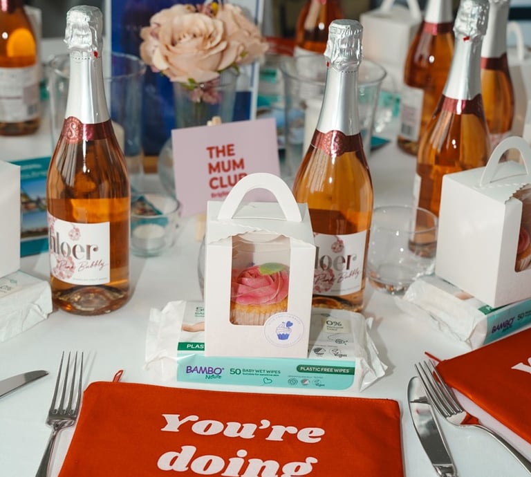 Champagne bottles and gift boxes at a professional event photoshoot in Brighton