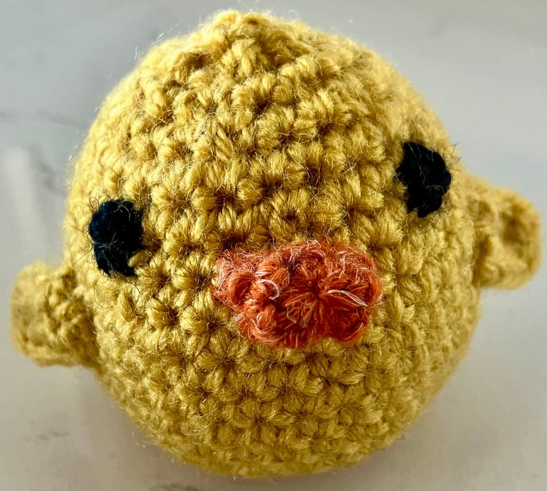 Yellow handmade crocheted chick