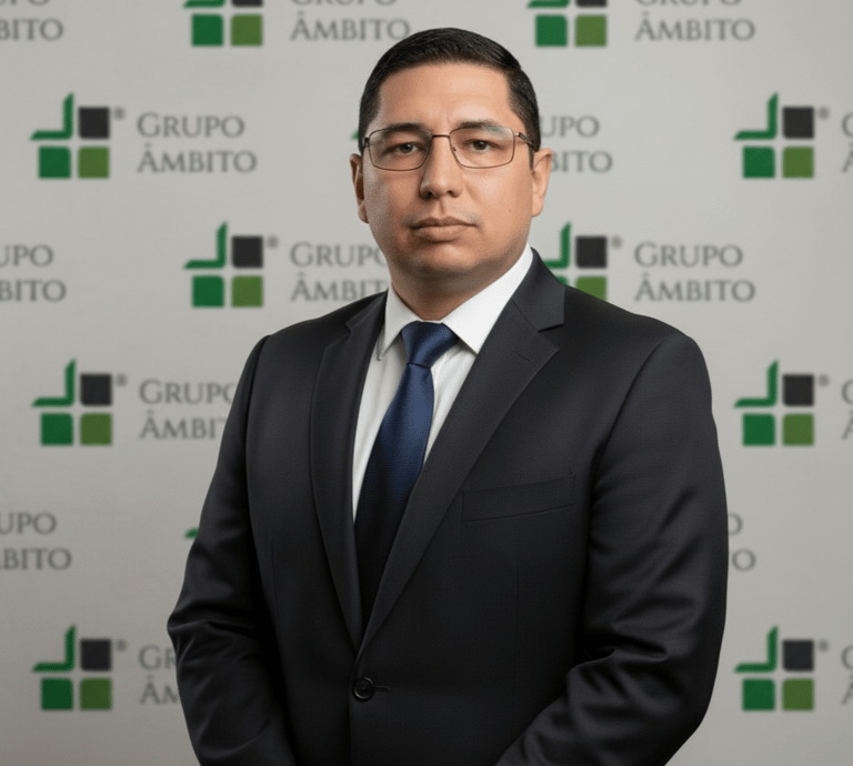 a man in a suit and tie standing in front of a group of people
