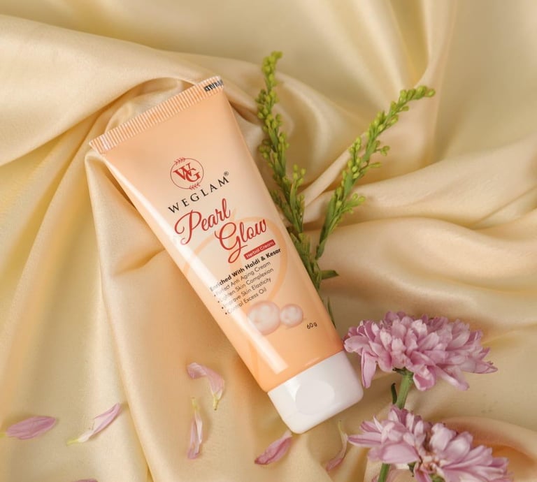 a tube of cream on a silk fabric covered surface