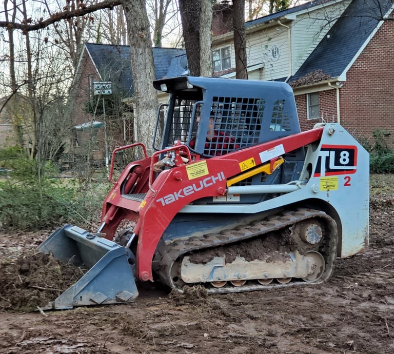 Residential grading and excavation in Catawba County NC using skid steer equipment for yard leveling