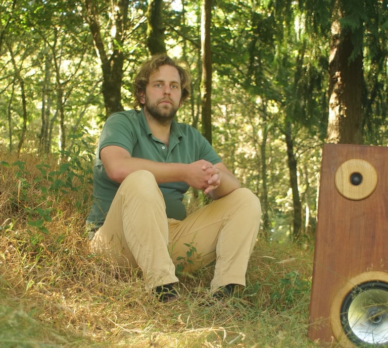 Guus Fölkel from Fölkel Audio with Constellation hi-fi speaker set in forest