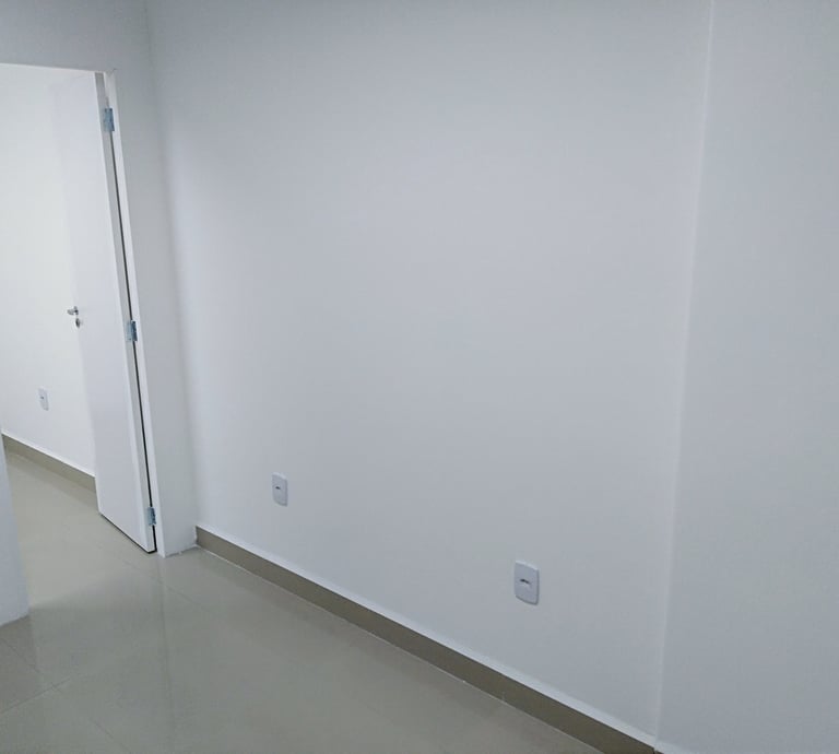 sala com divisória em drywall.