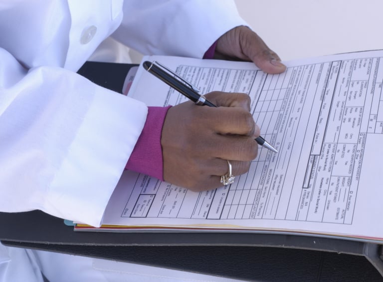 A woman filling out a form