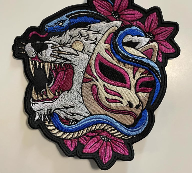 a patchwork embroidered on a white background