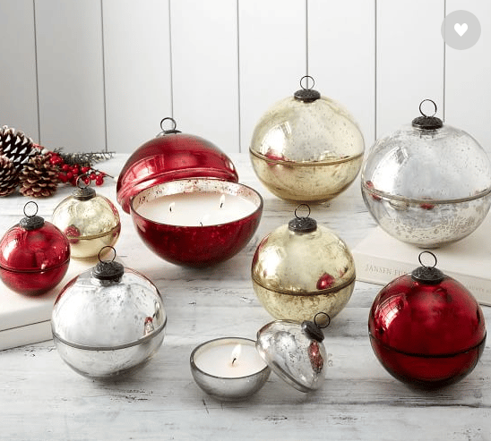 a group of christmas ornaments and candles